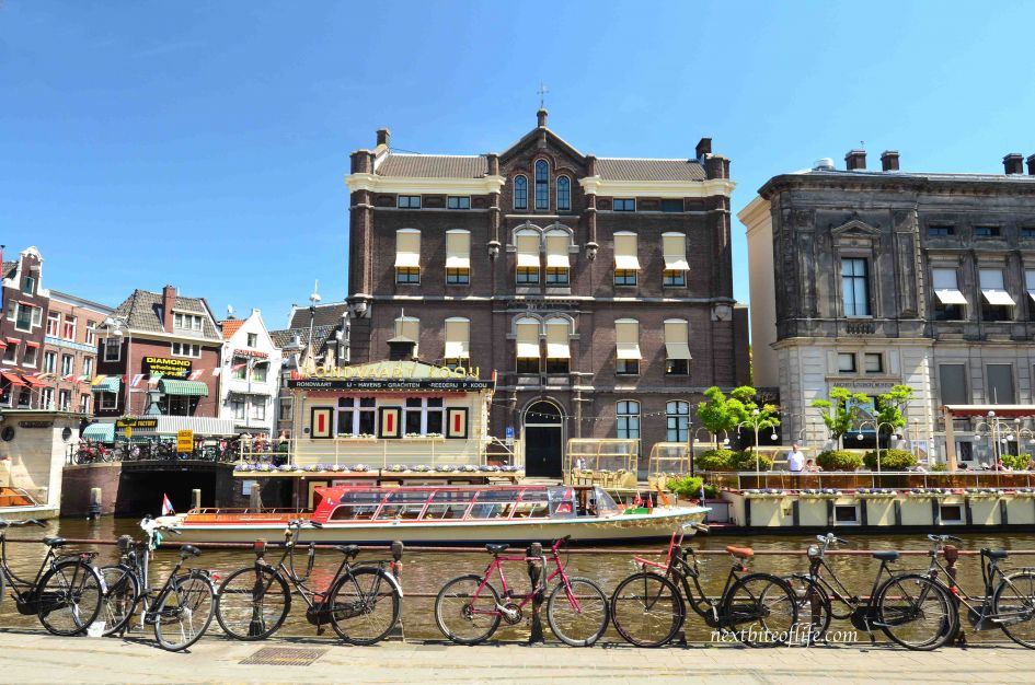 Amsterdam Is Ordinary. (Why I think it's just...Okay) 6 bikes by canal amsterdam