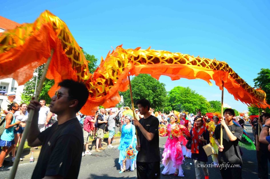 Berlin Carnival of Culture & Best Parts Of Berlin To Visit 13 Chinese float at carnival..orange long dragon held afloat