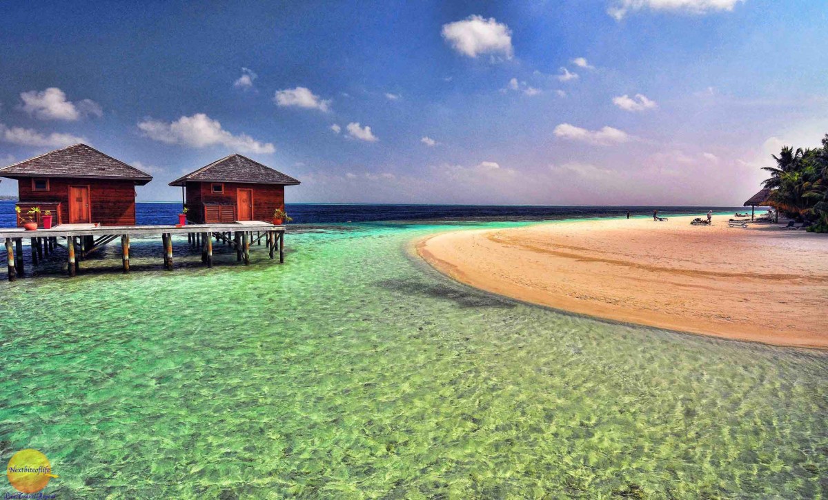 vilamendhoo spa huts and beach maldives image