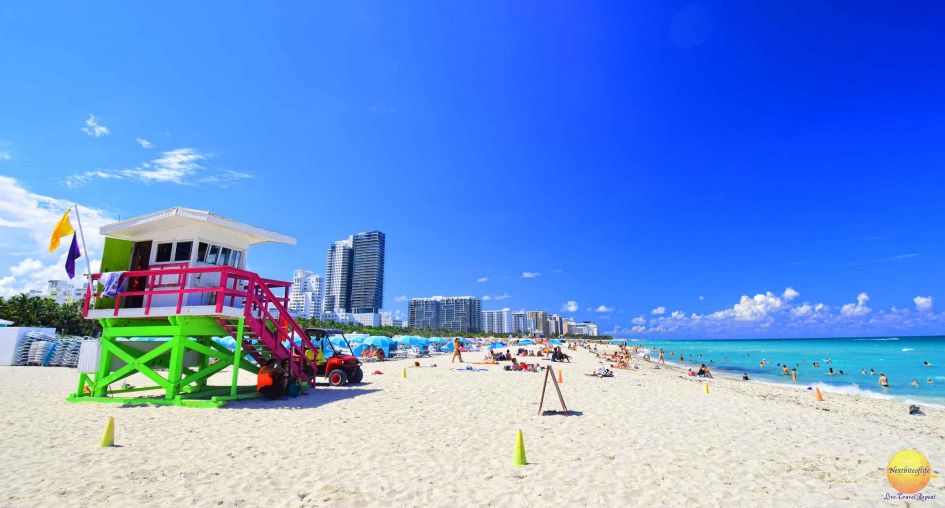 Beach-miami with lifeguard station and people