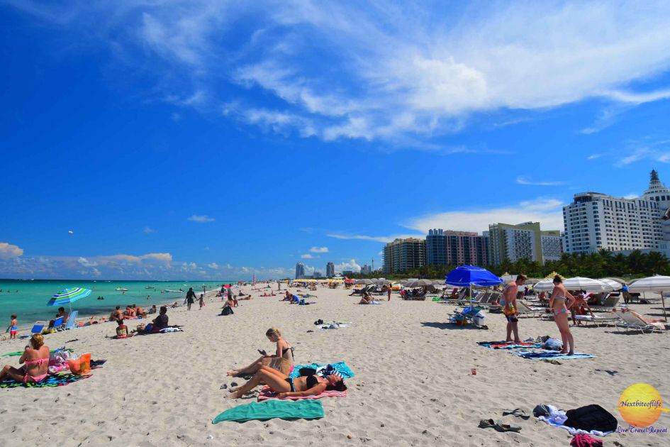 Miami beach with people and buildings