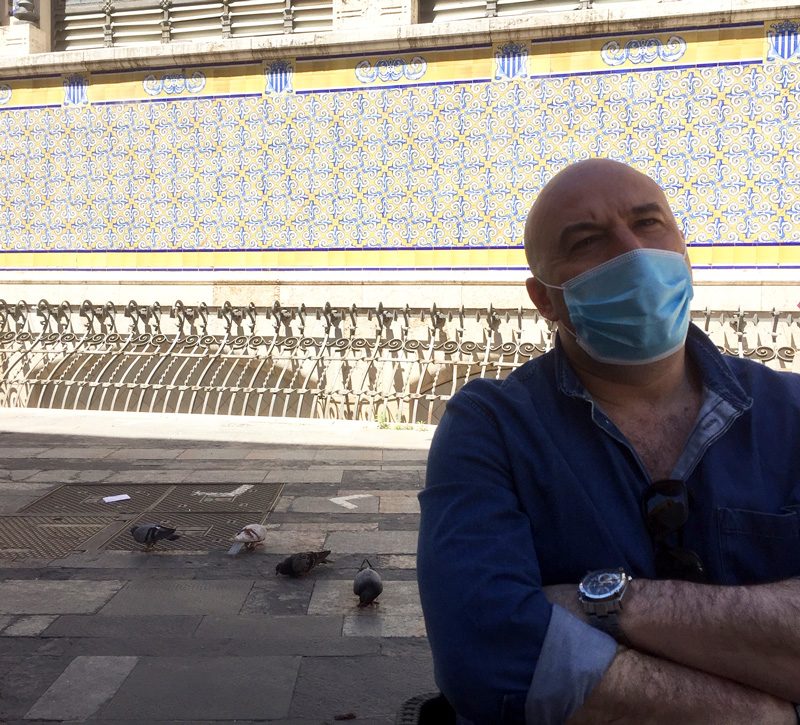 Loving Expat Life In Lisbon Portugal 7 Fede in mask at table