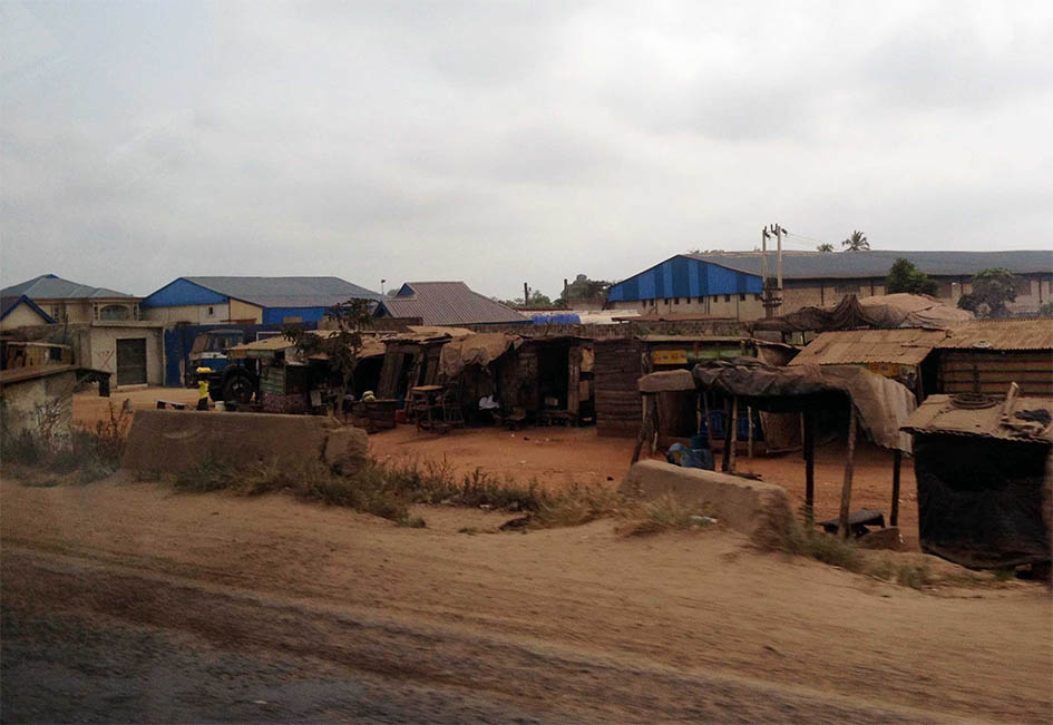 Rural street Lagos with shack houses in the good riddance to the year 2020