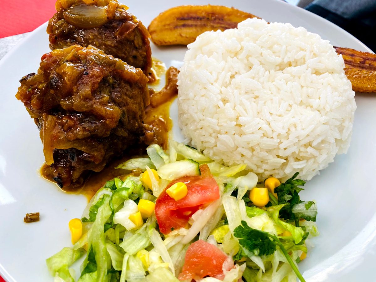 ONE DOWN, ONE TO GO. A Valencia Update 8 rice and albondigas colombian food plate in one down, one to go post nextbiteoflife.