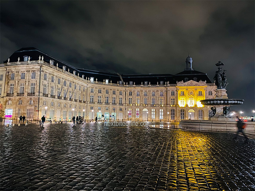 Place de la Bourse at night in Bordeaux, another reason to visit Bordeaux in the fall