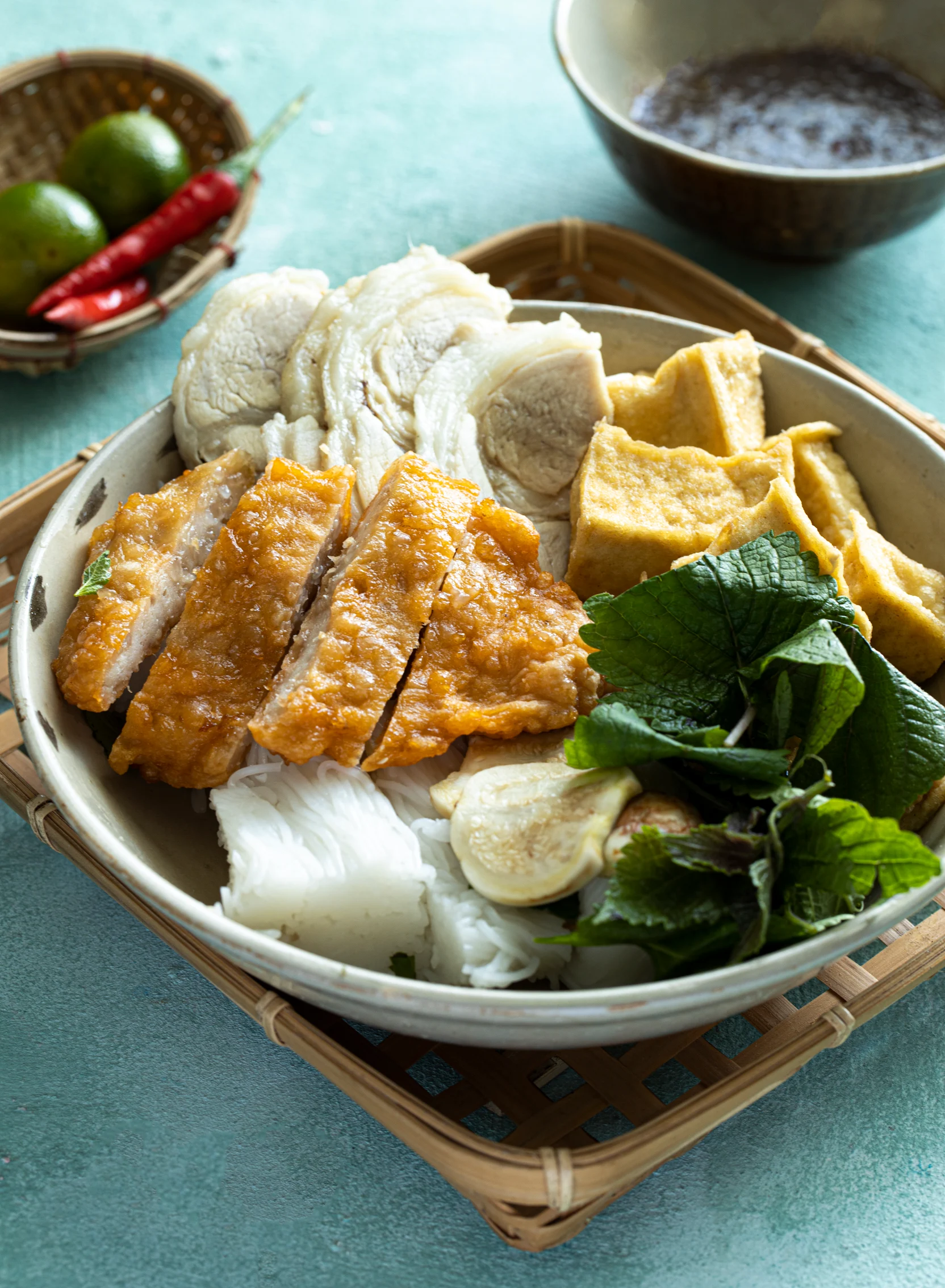 Vietnamese dish Bun Dao mam tom with chicken in a bowl on living well in Vietnam for less