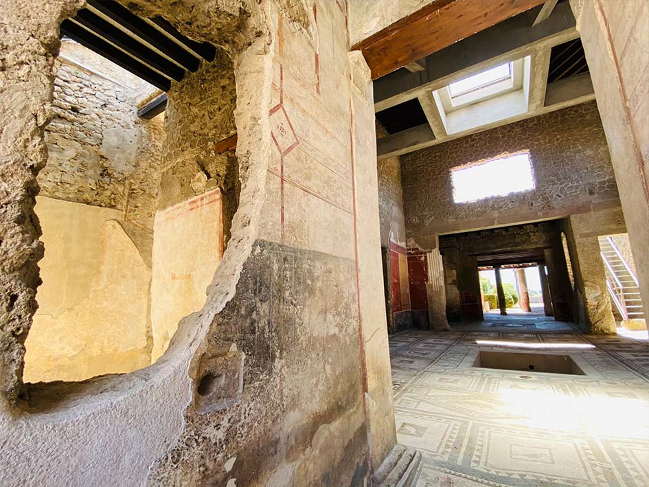 interior of old palace in Pompeii with mosaics on the floor